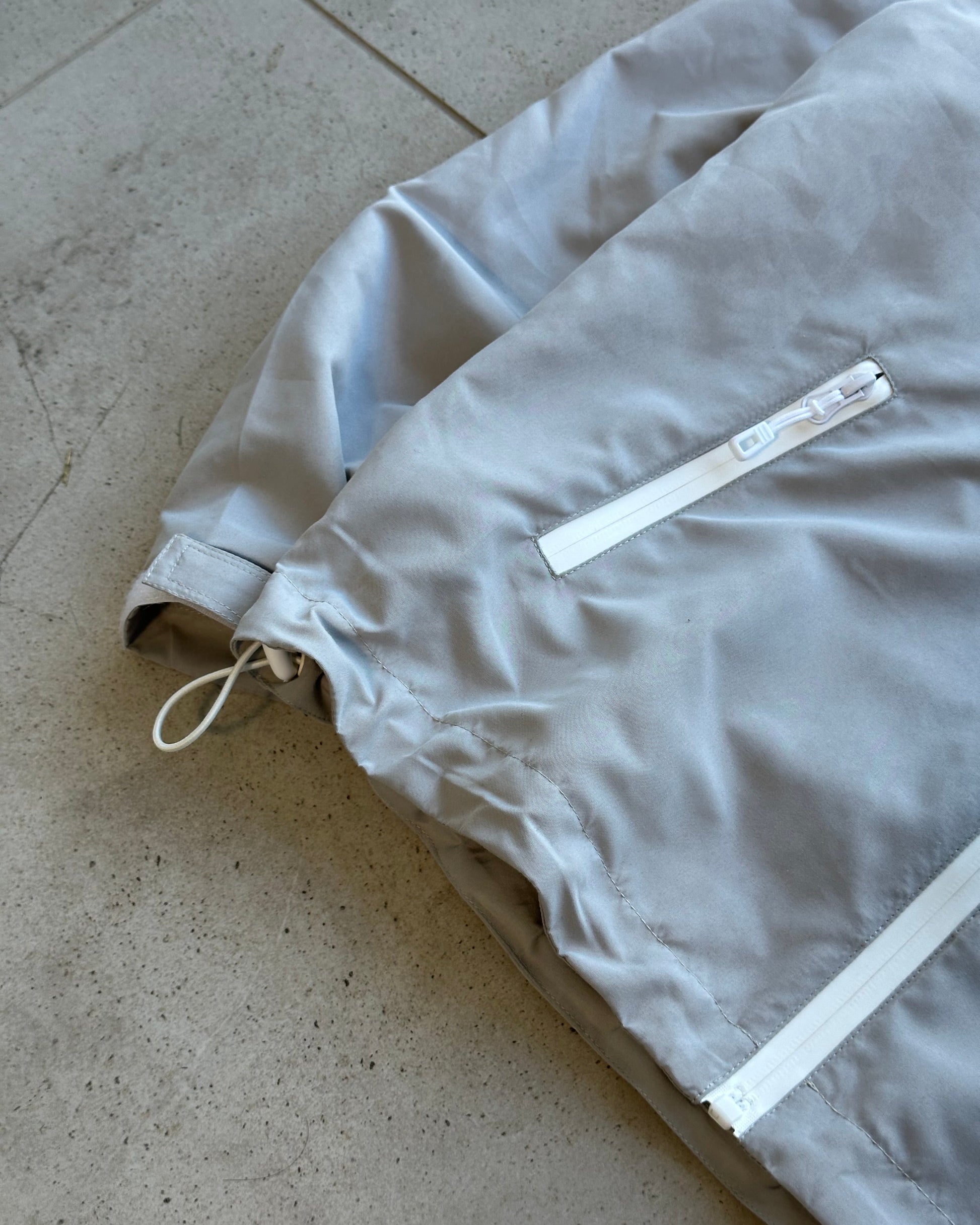 LEOPARD WATER REACTIVE RAIN JACKET - GREY