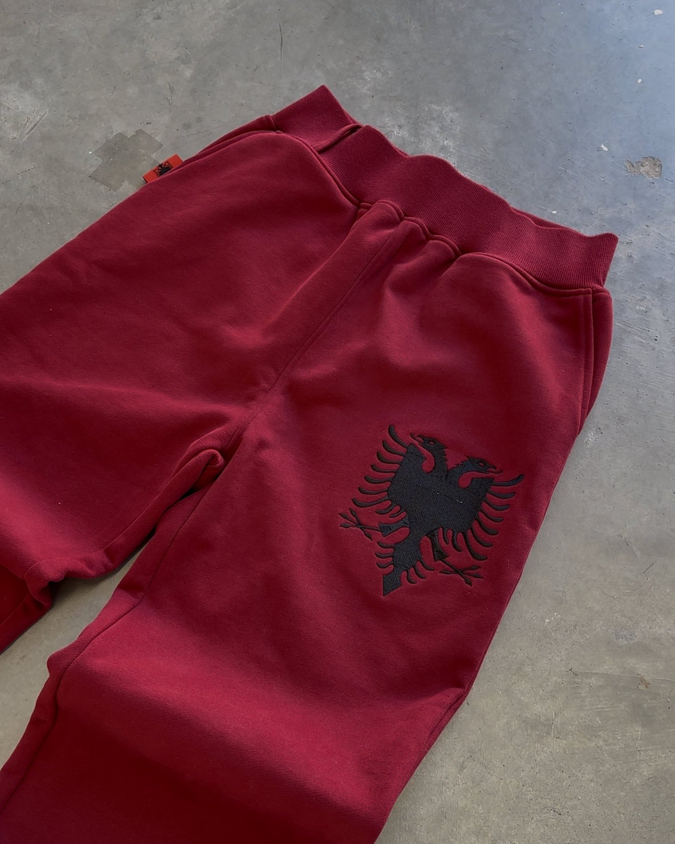 ALBANIA ZIP JOGGER - CRIMSON RED